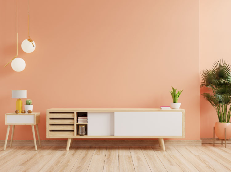 An beautifully placed dresser table with a lamp